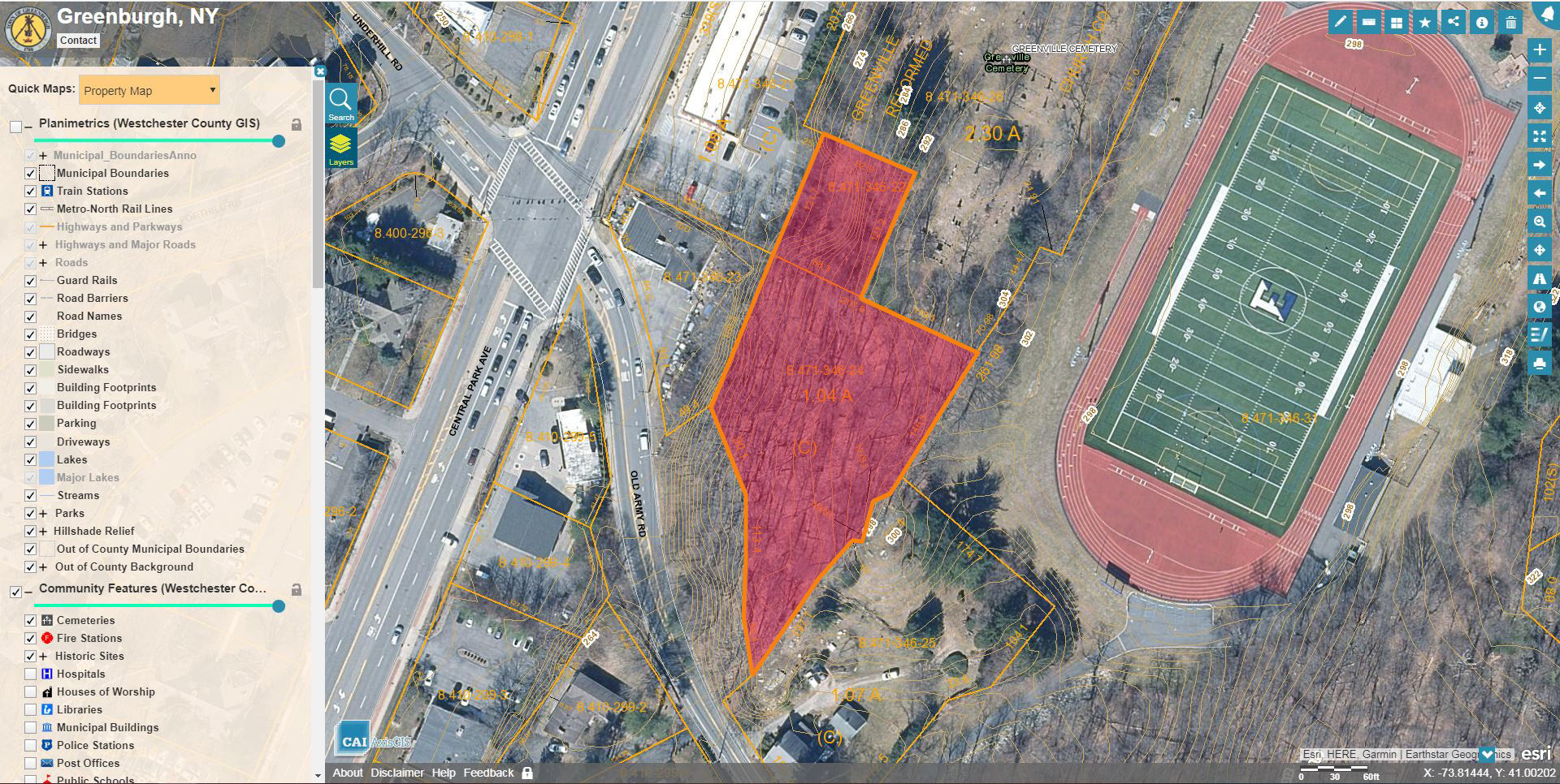 Greenburgh GIS property map with the 1.29-acre wooded parcel shaded red, between Old Army Road and the Edgemont High School track and football field, next to Greenville Cemetery.